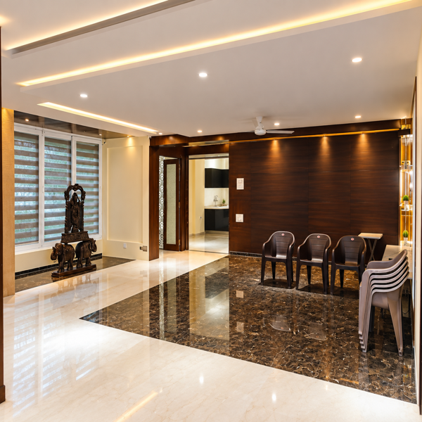 Luxury living and dining area, spacious apartment interior, premium residential home, polished marble flooring, elegant dining space, modern living room, dark wooden accent wall, warm LED lighting, ceiling lights, large windows, decorative statue, dining chairs, contemporary apartment design, sophisticated home interior, spacious common area, premium flooring, bright indoor space, luxury flat interiors, modern residential architecture, elegant ceiling design, wooden wall paneling, stylish dining zone, polished floor reflection, warm ambient lighting, contemporary living area, premium apartment interior, spacious family area, clean and well maintained home, attractive interior design, modern home decor, elegant residential space, luxury property interior, comfortable dining arrangement, premium common room, stylish wooden accents, high quality flooring, recessed ceiling lights, contemporary home styling, sophisticated apartment, bright and airy living space, elegant marble floor, modern dining area, premium residential design, decorative interior features, luxury home showcase, spacious living environment, clean modern apartment, warm lighting design, stylish wall finish, polished surfaces, contemporary flat design, upscale home interior, premium property presentation, beautiful residential common area, elegant dining room, modern living space, luxury apartment photography, spacious floor plan, attractive ceiling lighting, dark wood interior, sophisticated residential architecture, premium home finish, bright apartment interior, contemporary dining space, clean flooring, elegant home ambiance, modern residential property, high end flat interior, stylish common room, premium living area, spacious dining corner, warm luxury interior, refined home design, polished marble surfaces, attractive window area, modern indoor space, comfortable residential environment, luxury home aesthetics, premium apartment showcase, elegant living and dining interior, contemporary property styling, well lit residential room, modern interior architecture, spacious common area design, sophisticated home setting, clean luxury apartment, premium residential interiors, beautiful home presentation, warm and welcoming living space.